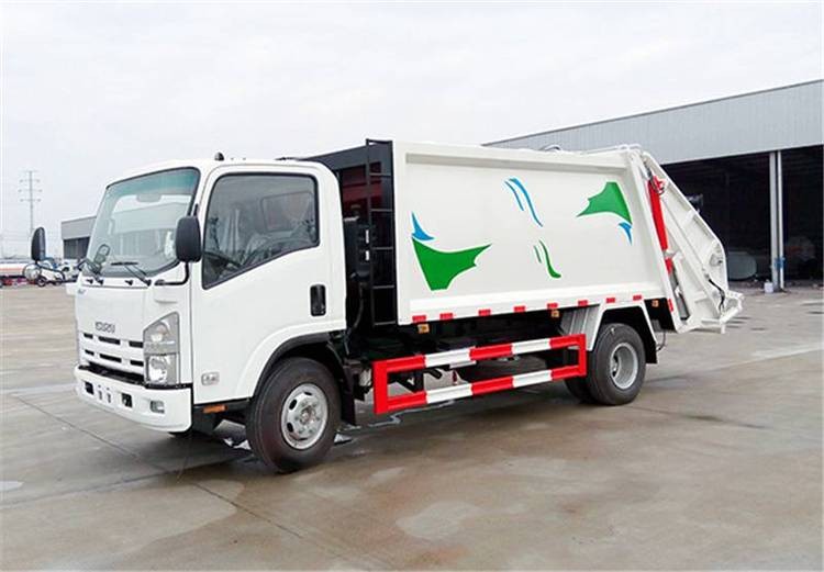 ISUZU 600P 7cbm refuse compactor garbage transporting truck